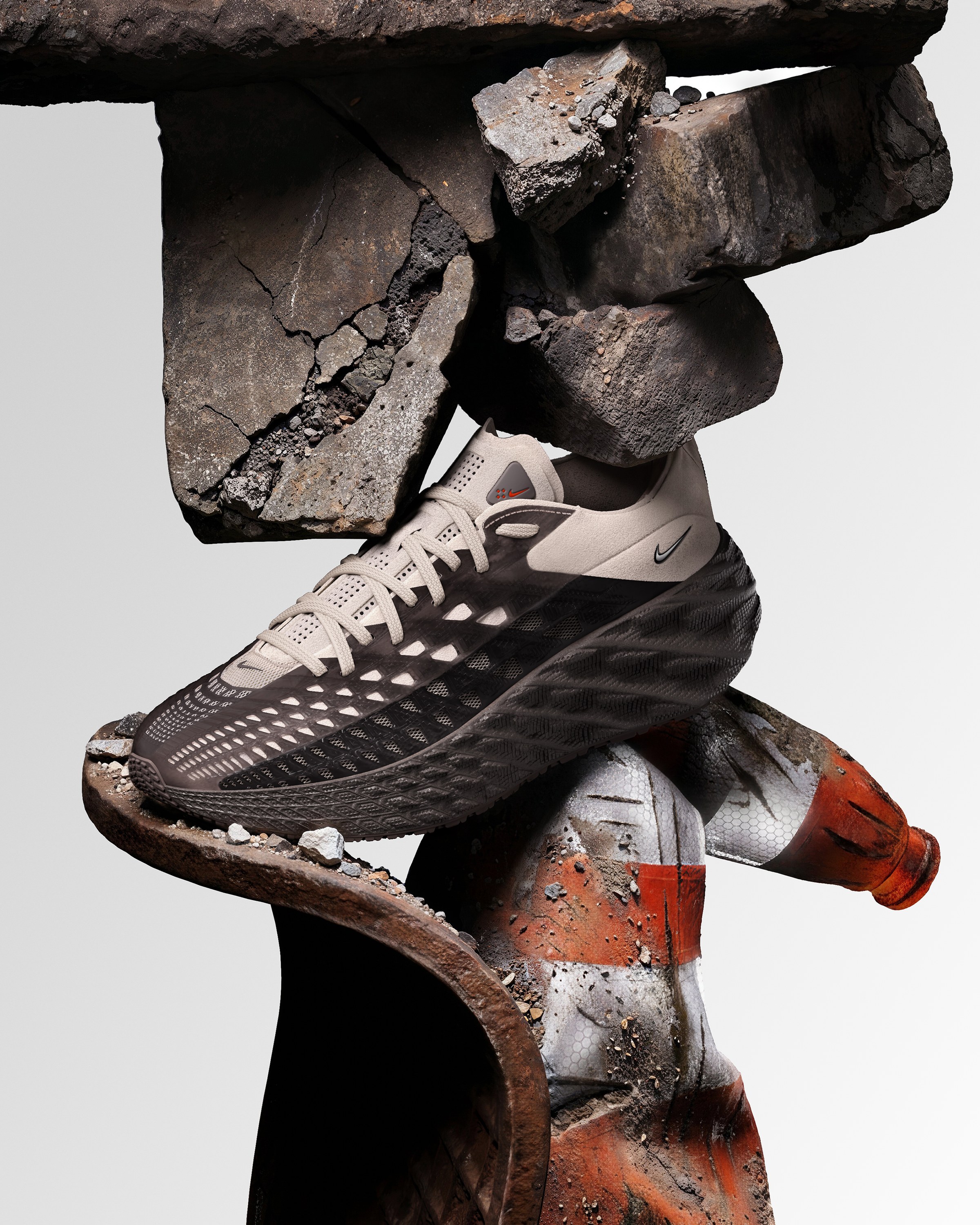Nike Ava Edge balanced on a stack of rubble and a rusted pipe