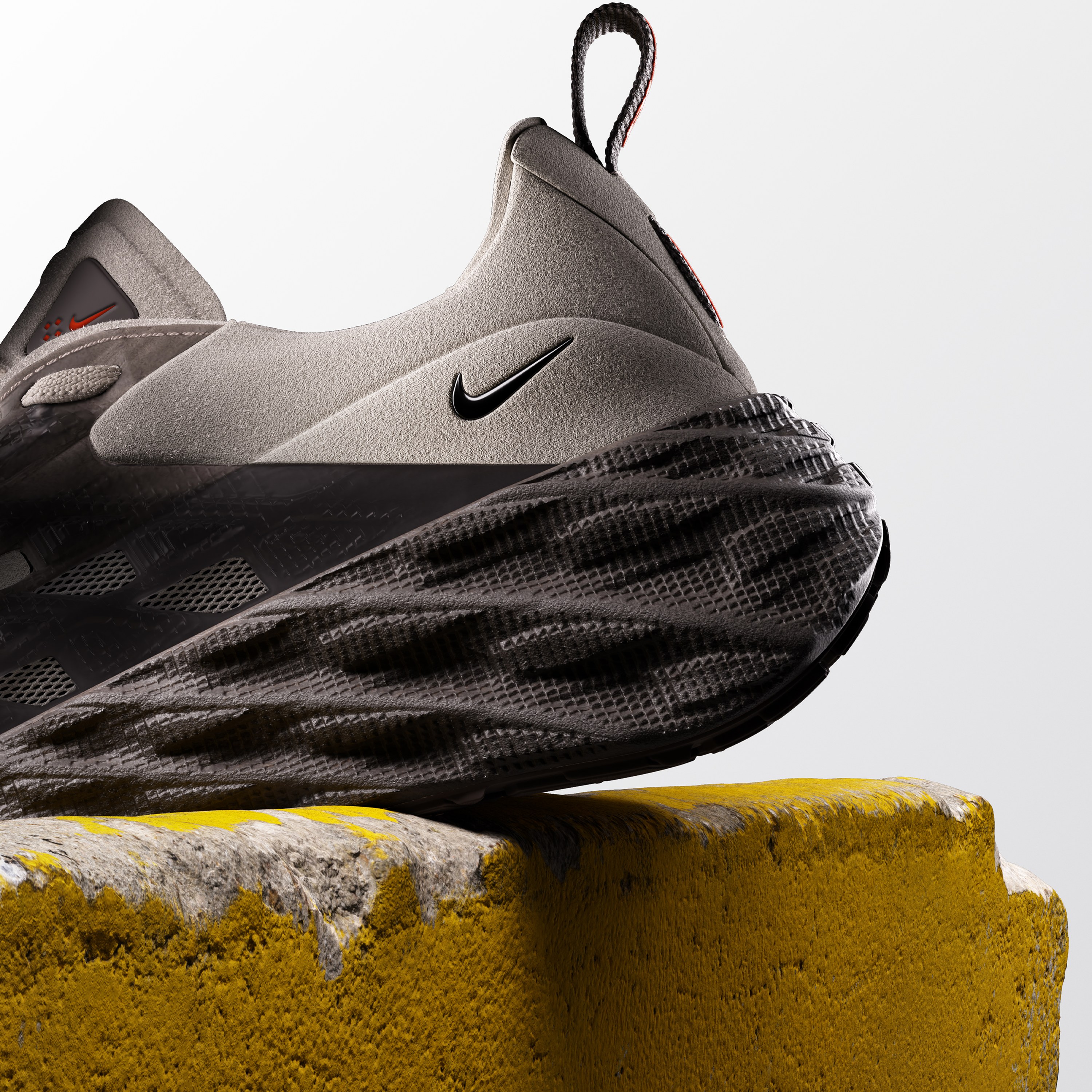 Nike Ava Edge heel on a moss-covered yellow block